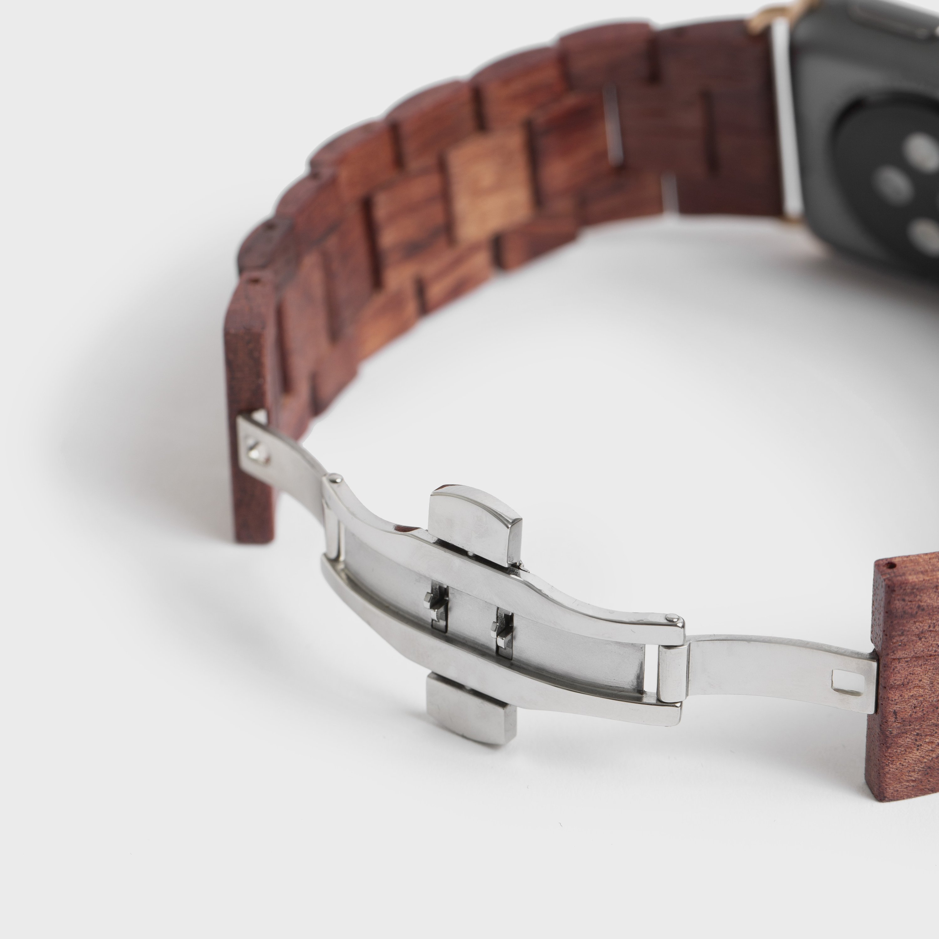 Wood Apple Watch Band featuring a natural wood finish and stainless steel buckle, designed for comfort and style.