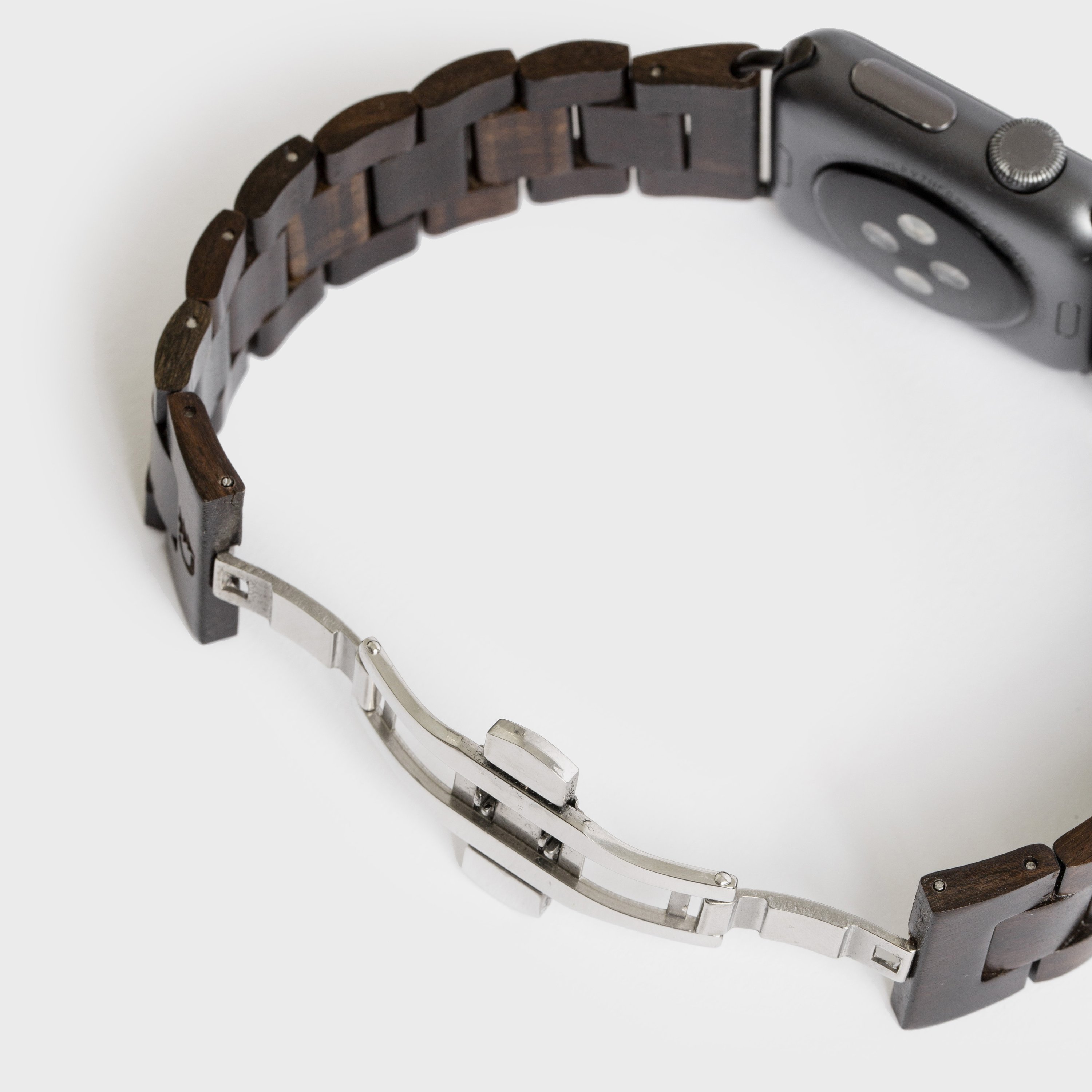 Wood Apple Watch Band featuring a natural wood finish and stainless steel buckle, designed for comfort and style.