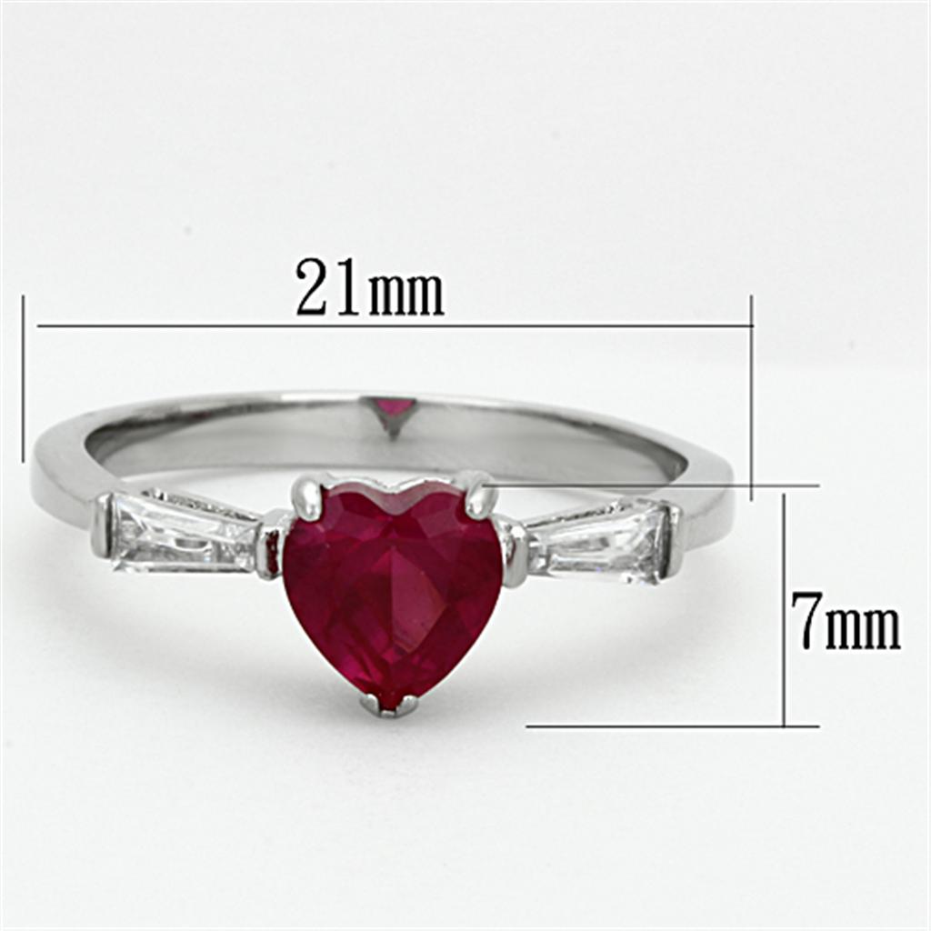 Elegant women's stainless steel ring with cubic zirconia and ruby accent, showcasing a high-polished finish.