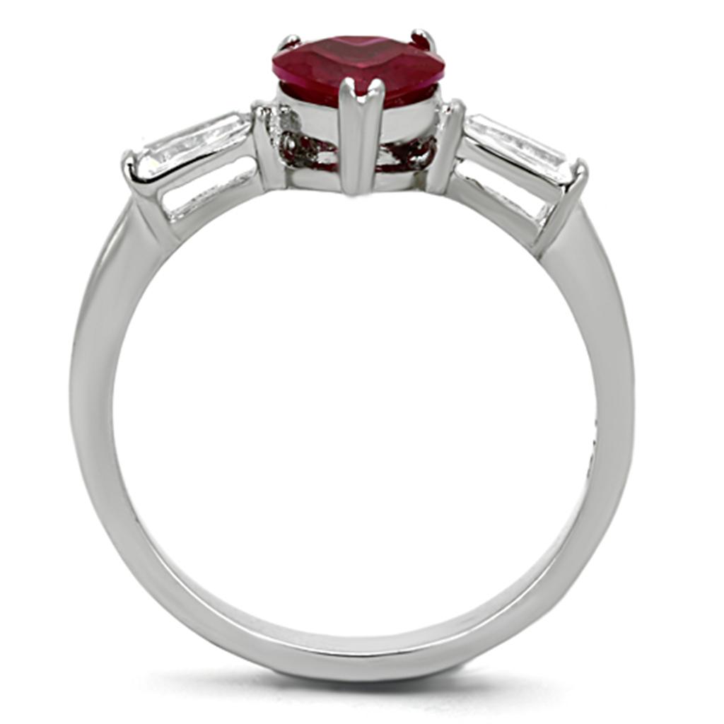 Elegant women's stainless steel ring with cubic zirconia and ruby accent, showcasing a high-polished finish.