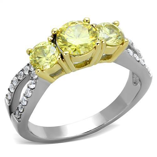 Elegant two-tone stainless steel ring with cubic zirconia and topaz accents for women.
