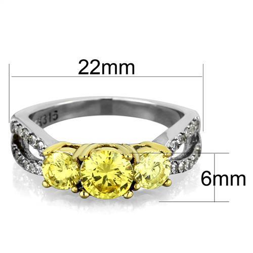 Elegant two-tone stainless steel ring with cubic zirconia and topaz accents for women.