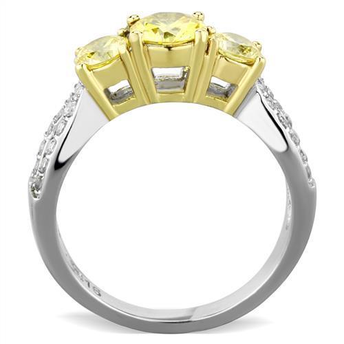 Elegant two-tone stainless steel ring with cubic zirconia and topaz accents for women.
