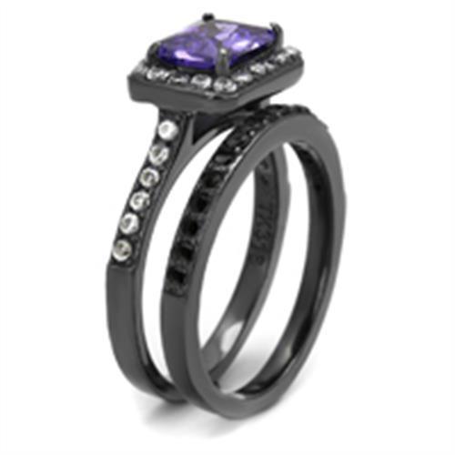 Elegant women’s stainless steel ring with cubic zirconia and tanzanite accents, featuring an IP light black finish.