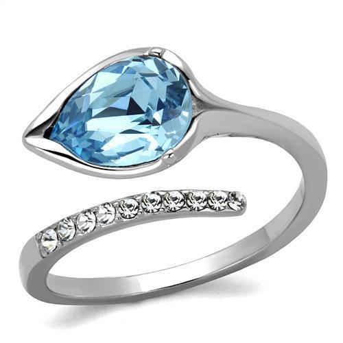 Elegant women’s stainless steel ring featuring a high polished finish and a stunning sea blue synthetic crystal centerpiece.