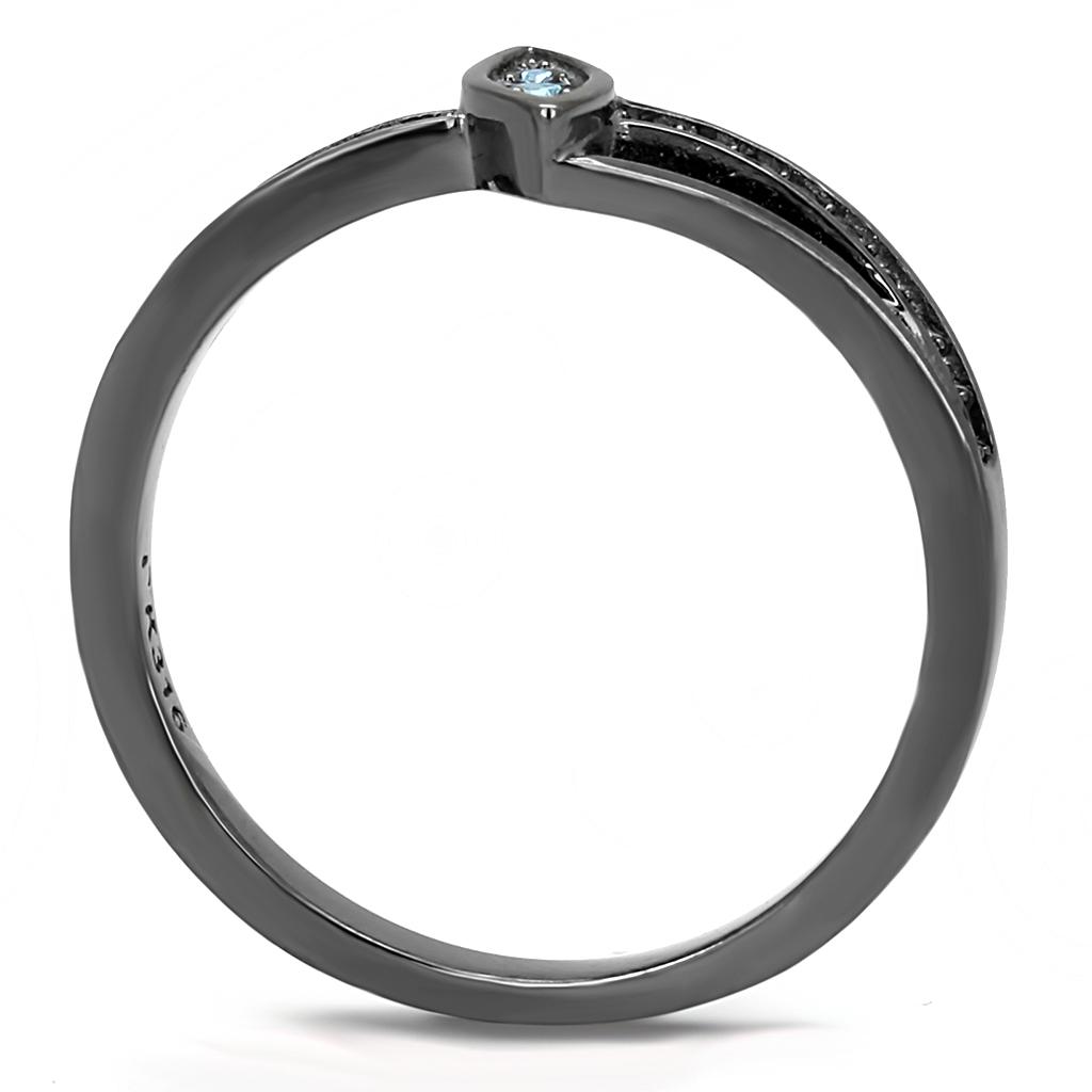 A stylish women’s stainless steel ring featuring a round sea blue synthetic crystal, showcasing a modern IP light black finish.