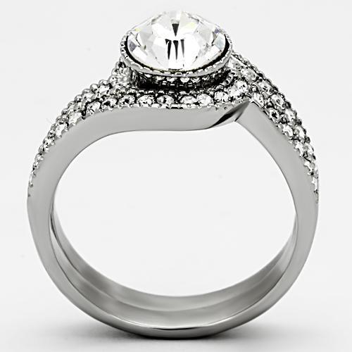 A beautiful women's stainless steel ring featuring a high-polished finish and a clear synthetic crystal centerpiece, showcasing elegance and durability.