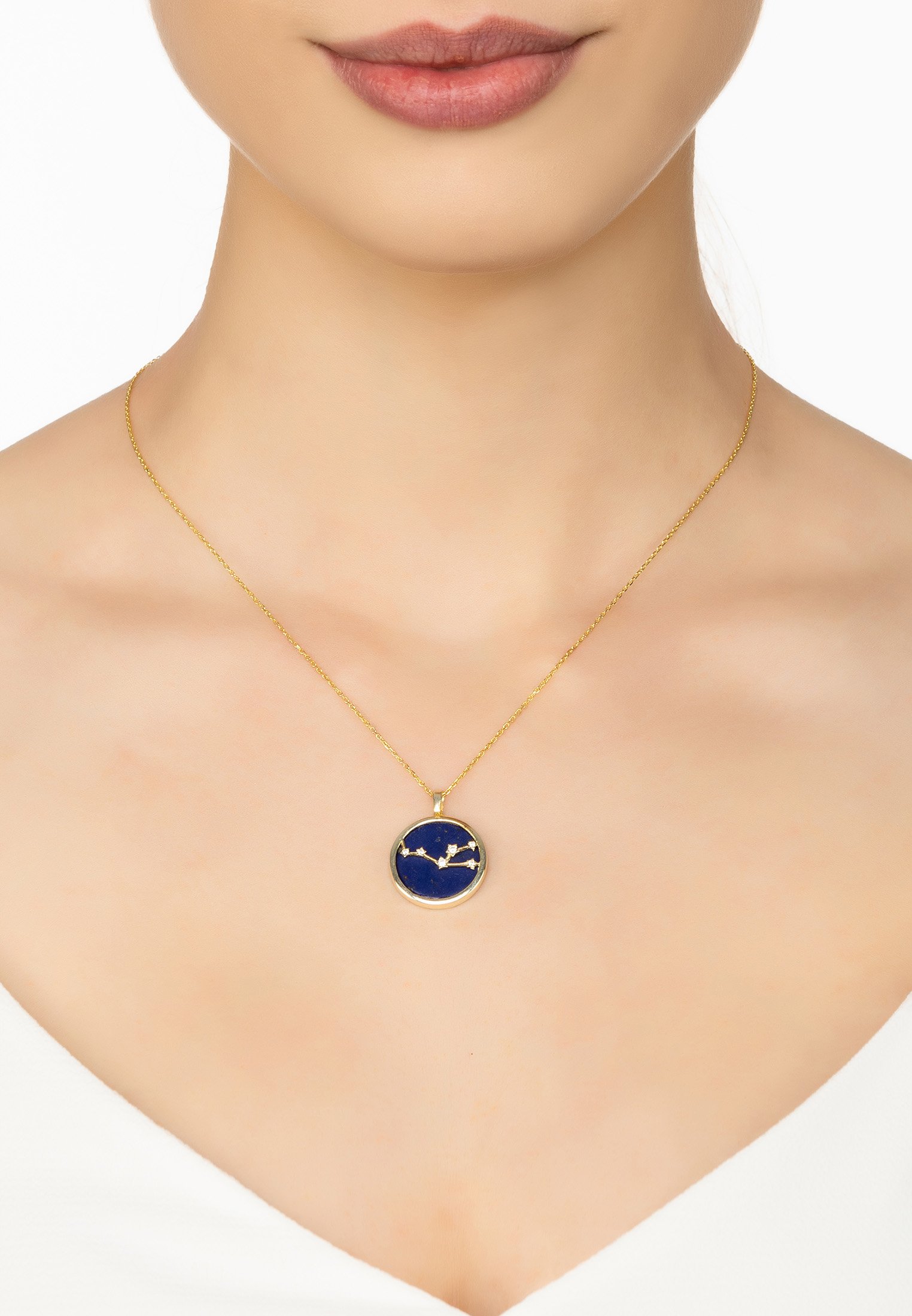 Zodiac Lapis Lazuli Gemstone Star Constellation Pendant Necklace in gold-dipped sterling silver with white cubic zirconia.