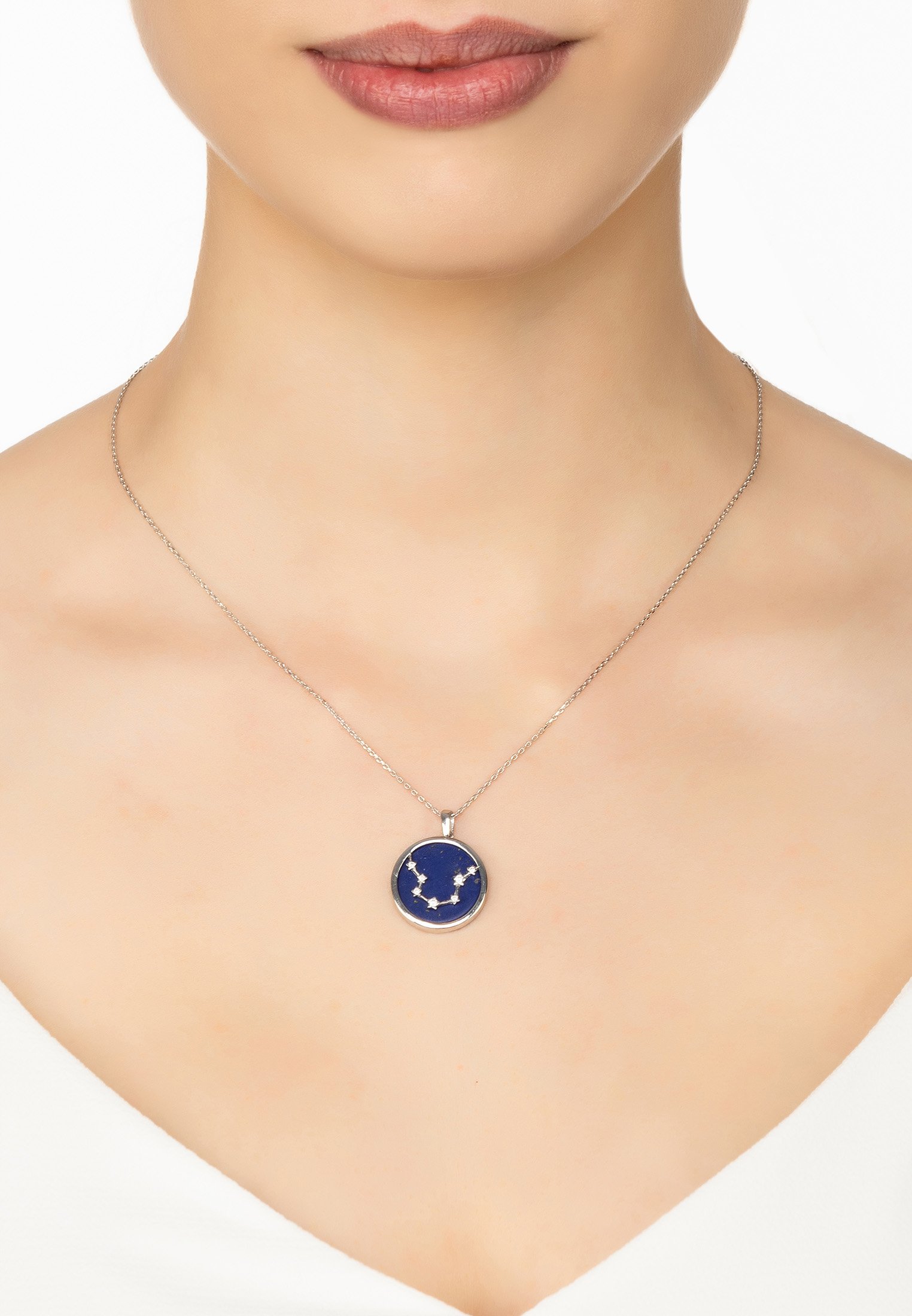 Zodiac Lapis Lazuli Gemstone Star Constellation Pendant Necklace featuring a deep blue lapis lazuli disc with sparkling cubic zirconia stars.