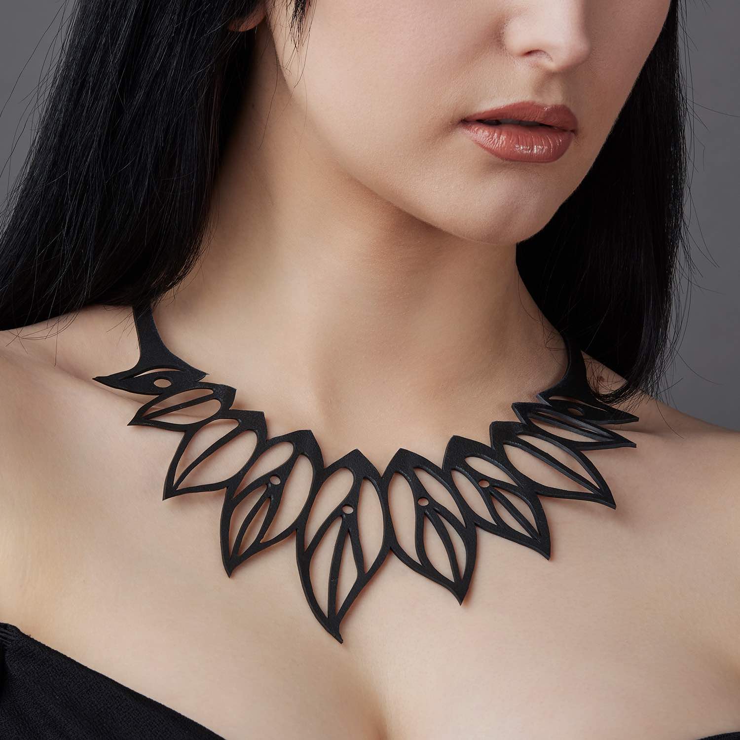 Zoe Recycled Rubber Leaf Necklace showcasing its elegant leaf design made from upcycled inner tubes, perfect for eco-conscious fashion lovers.