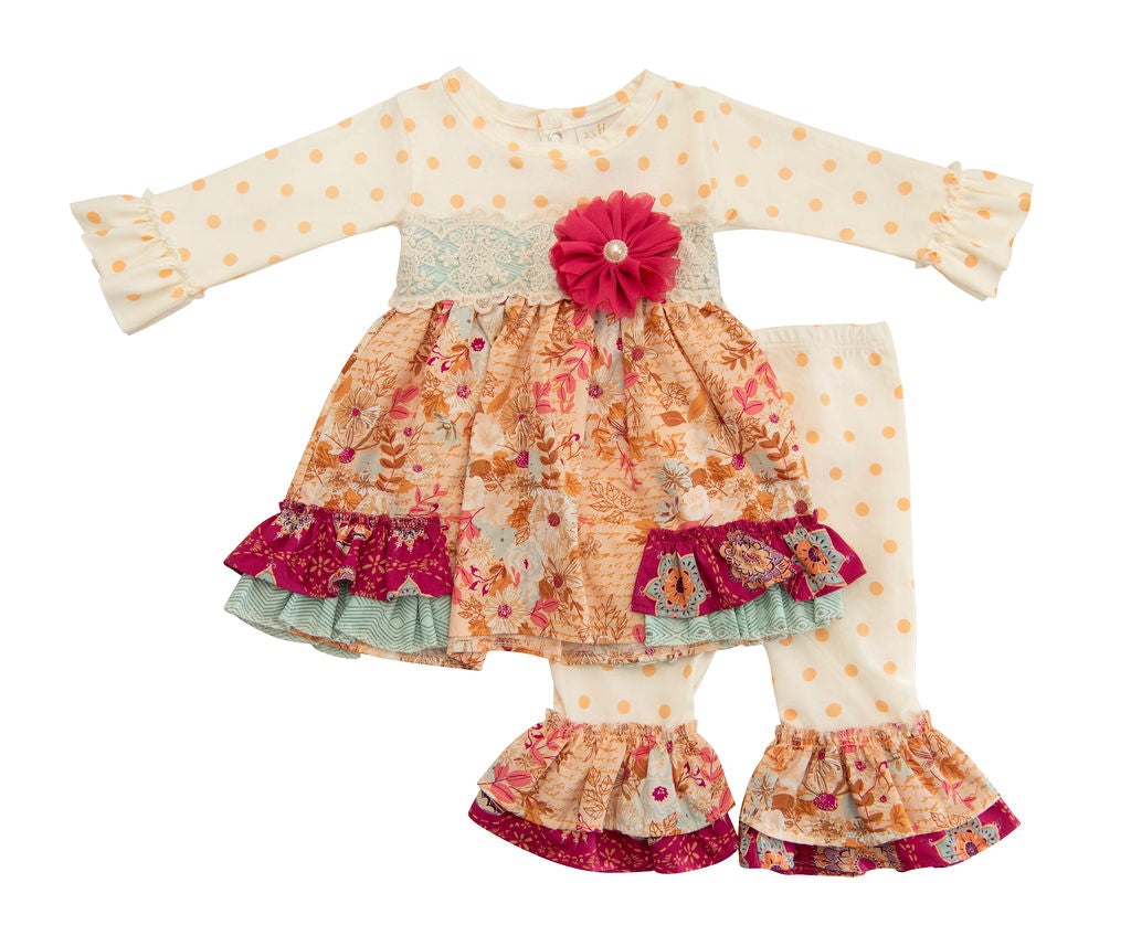 Amber Dreams Swing Set featuring autumn leaves and whimsical polka dot print, designed for little girls' outdoor play.