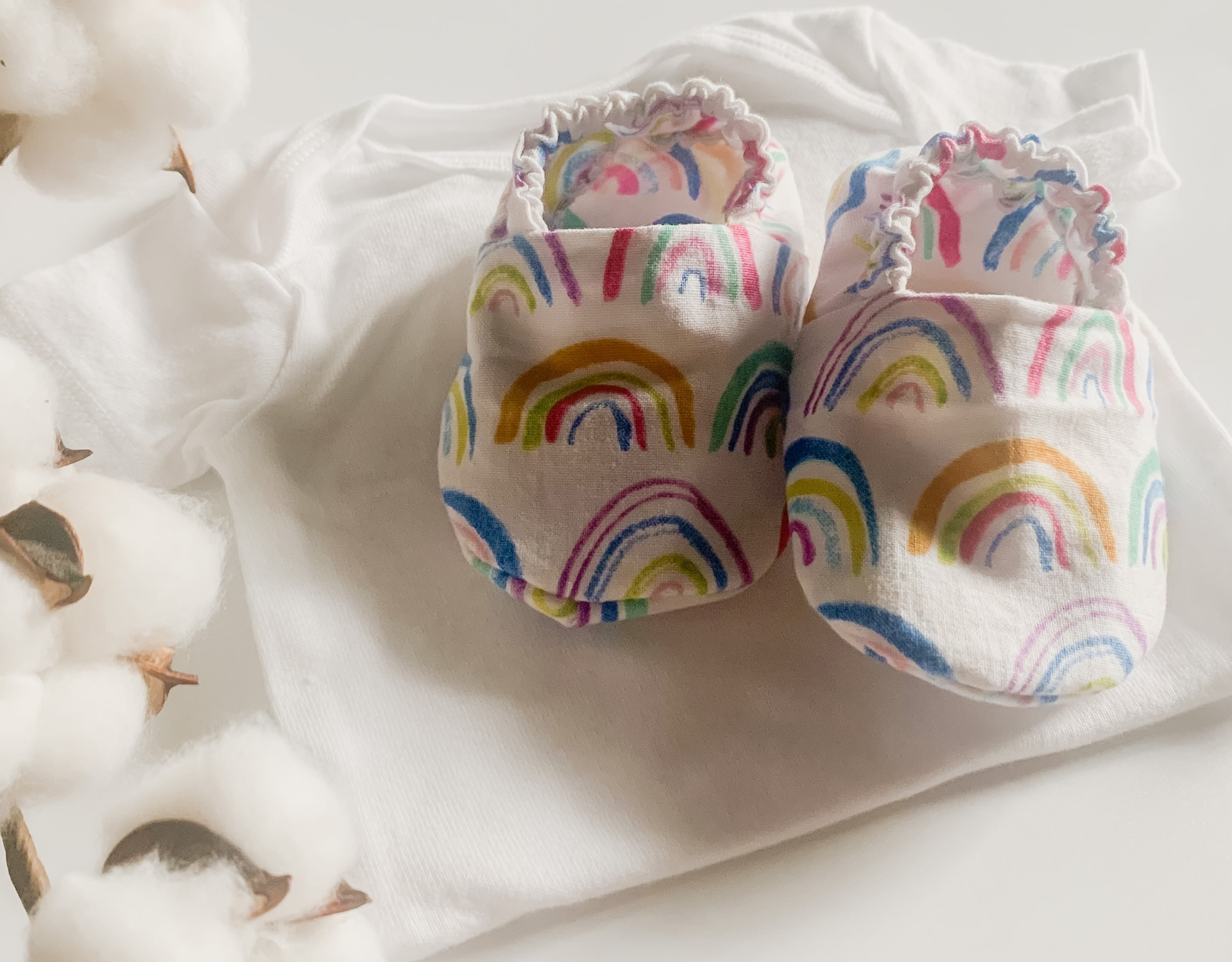 Boho Rainbow Elastic Baby Shoe featuring a colorful rainbow pattern on a white background, designed for indoor use.