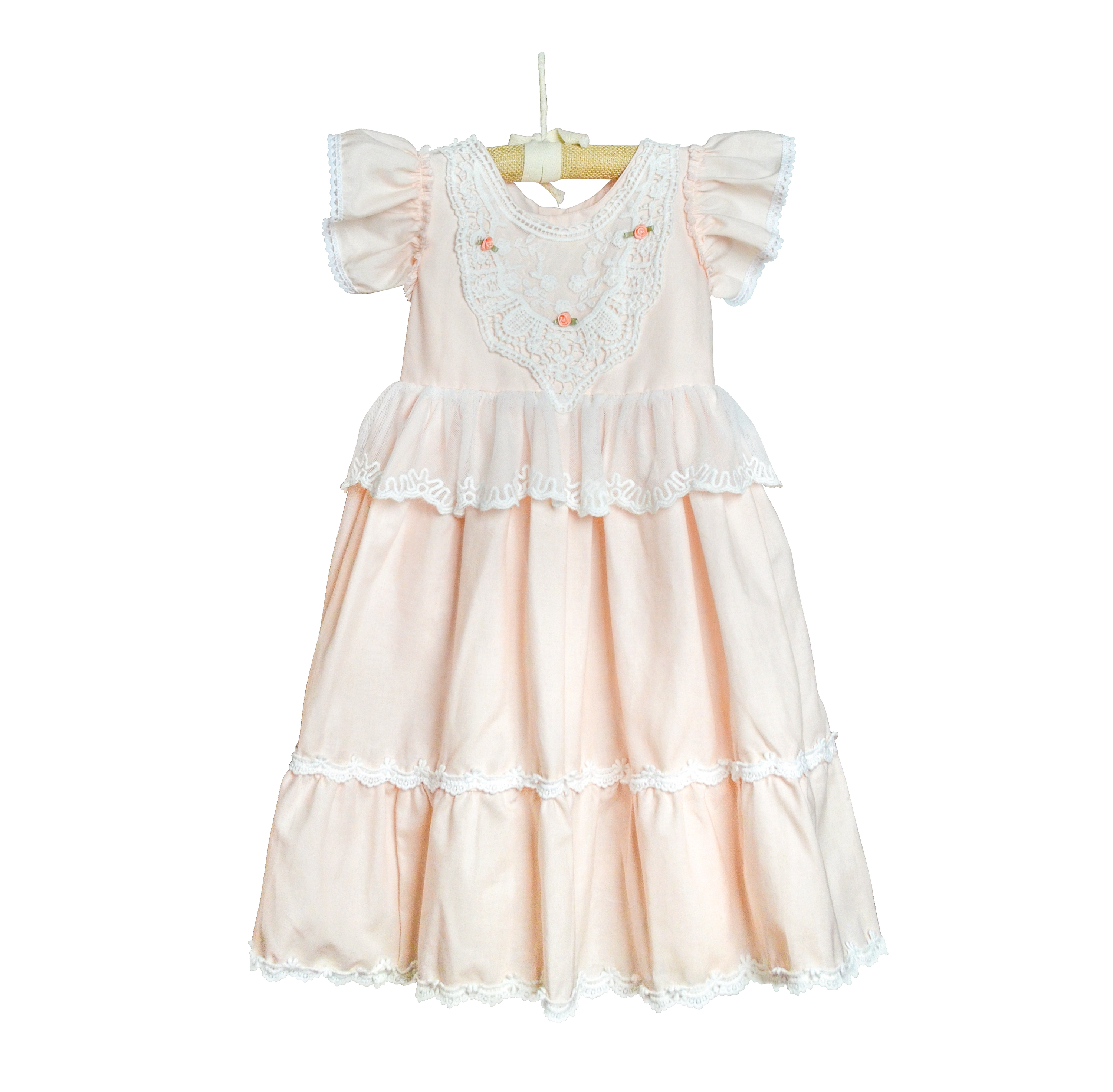 Caroline Big Girl Dress in pastel peach with delicate rose patterns, perfect for young girls' special occasions.