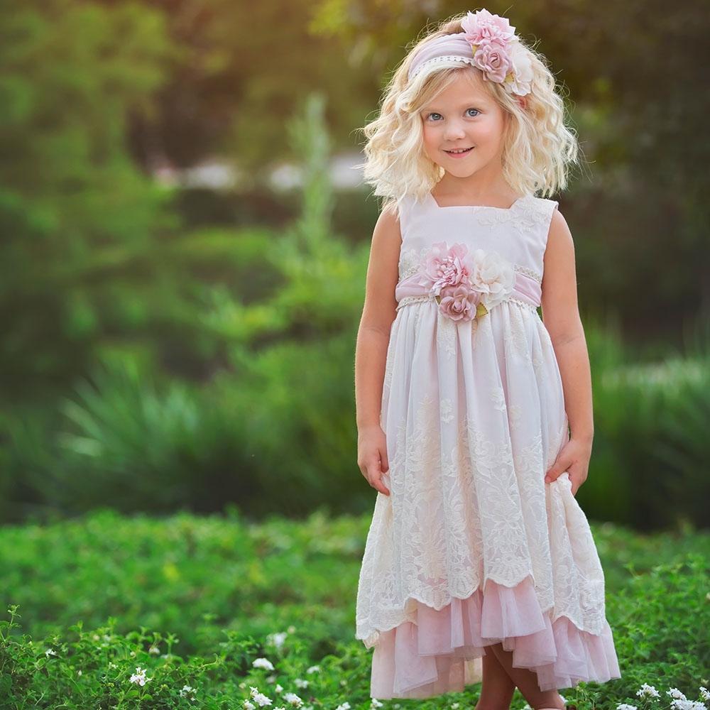 Elouise Heirloom Hi Lo Dress featuring a stylish hi-lo hemline in a soft fabric, perfect for various occasions.