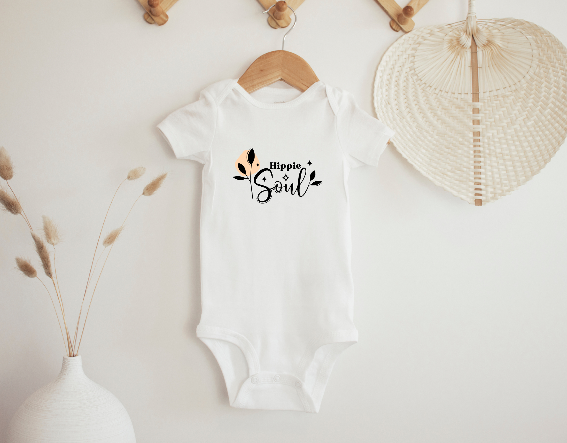 Hippie Soul Bodysuit for newborns, featuring a cute design and made from 100% cotton.