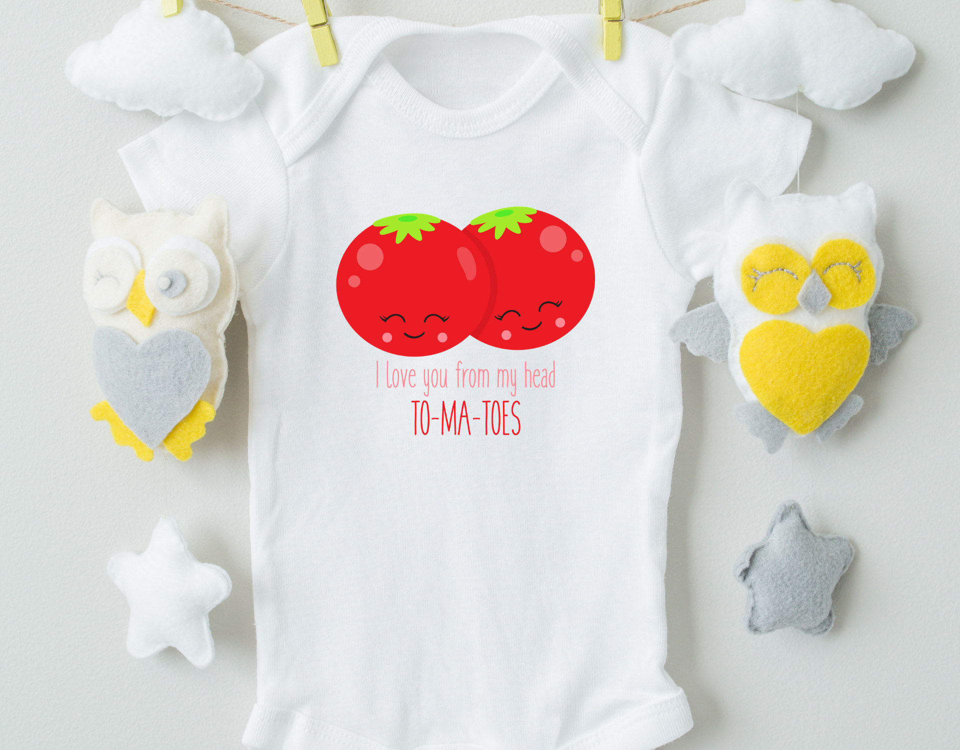 I Love You From My Head To My Tomatoes Cotton Baby Bodysuit featuring a playful design, made from 100% cotton with expandable neckline and snap closure.