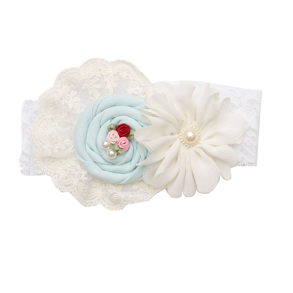 A soft pastel blue Iris Headband, perfect for stylish outfits.