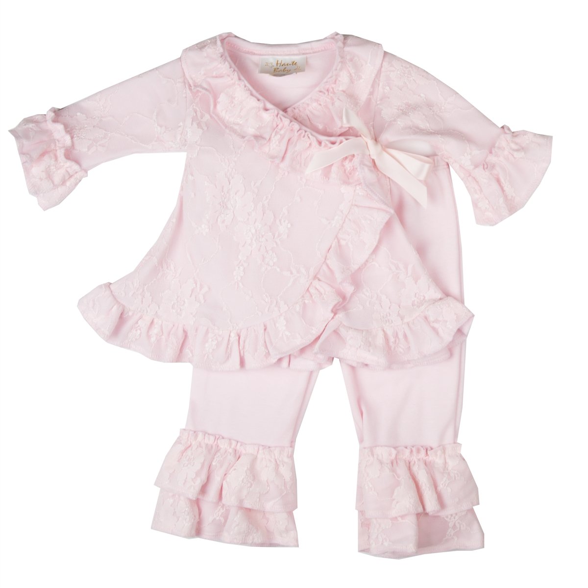 Sweet Rose Criss Cross Set featuring soft pink fabric with ruffles and lace, perfect for baby girls, includes matching headband.