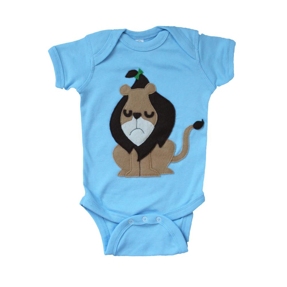 Adorable Cowardly Lion baby onesie featuring eco felt appliqué, perfect for toddlers.