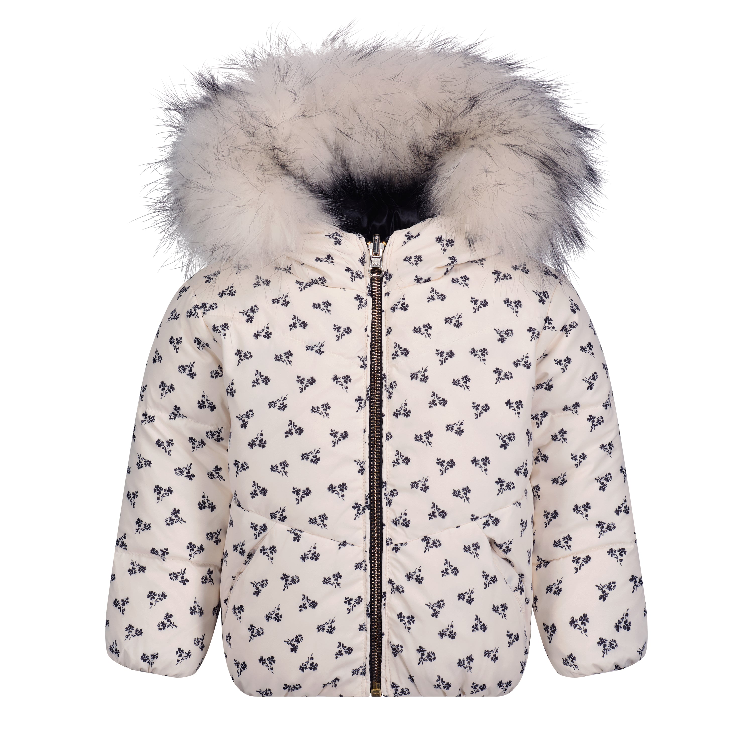 A reversible children's coat featuring a whimsical floral print on one side and a solid color on the other, with a luxurious raccoon fur collar and trendy side pockets.