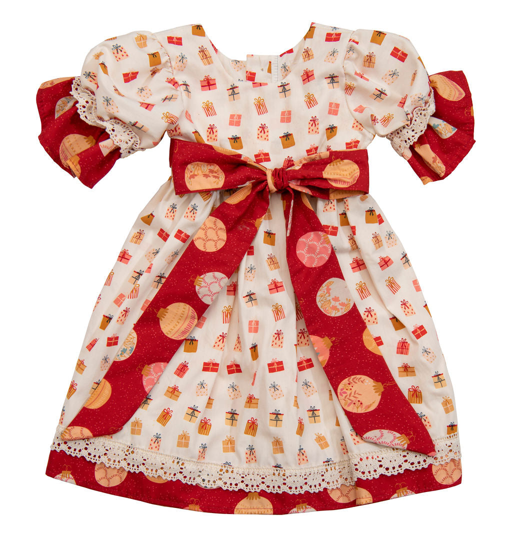 A stylish Time To Give Dress featuring a whimsical gift pattern, perfect for holiday celebrations.