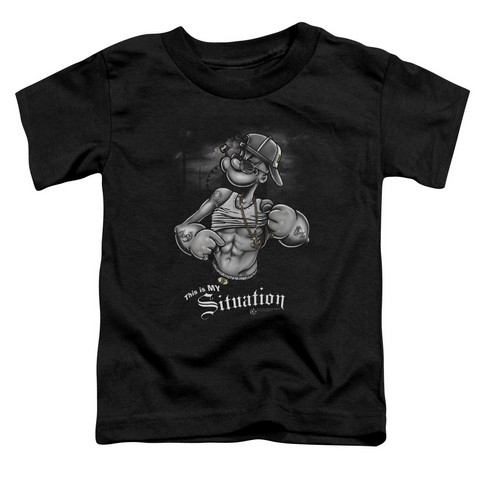 Cartoon character flexing muscles shirt.
