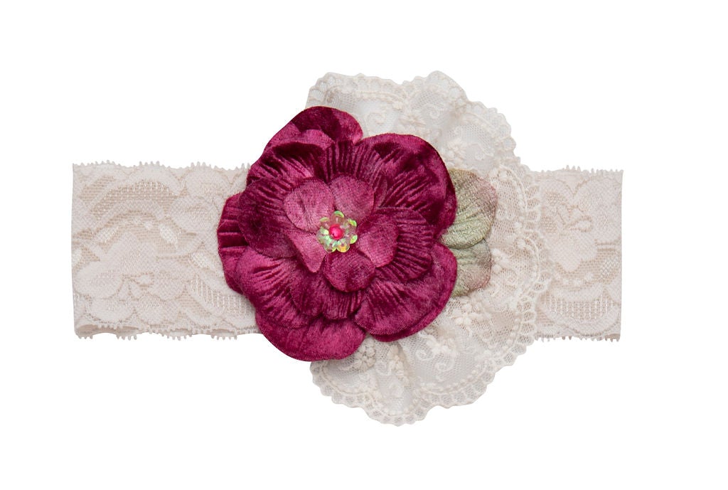 Violet Field Headband featuring intricate crocheted lace and rich purple fabric, elegantly styled on a neutral background.