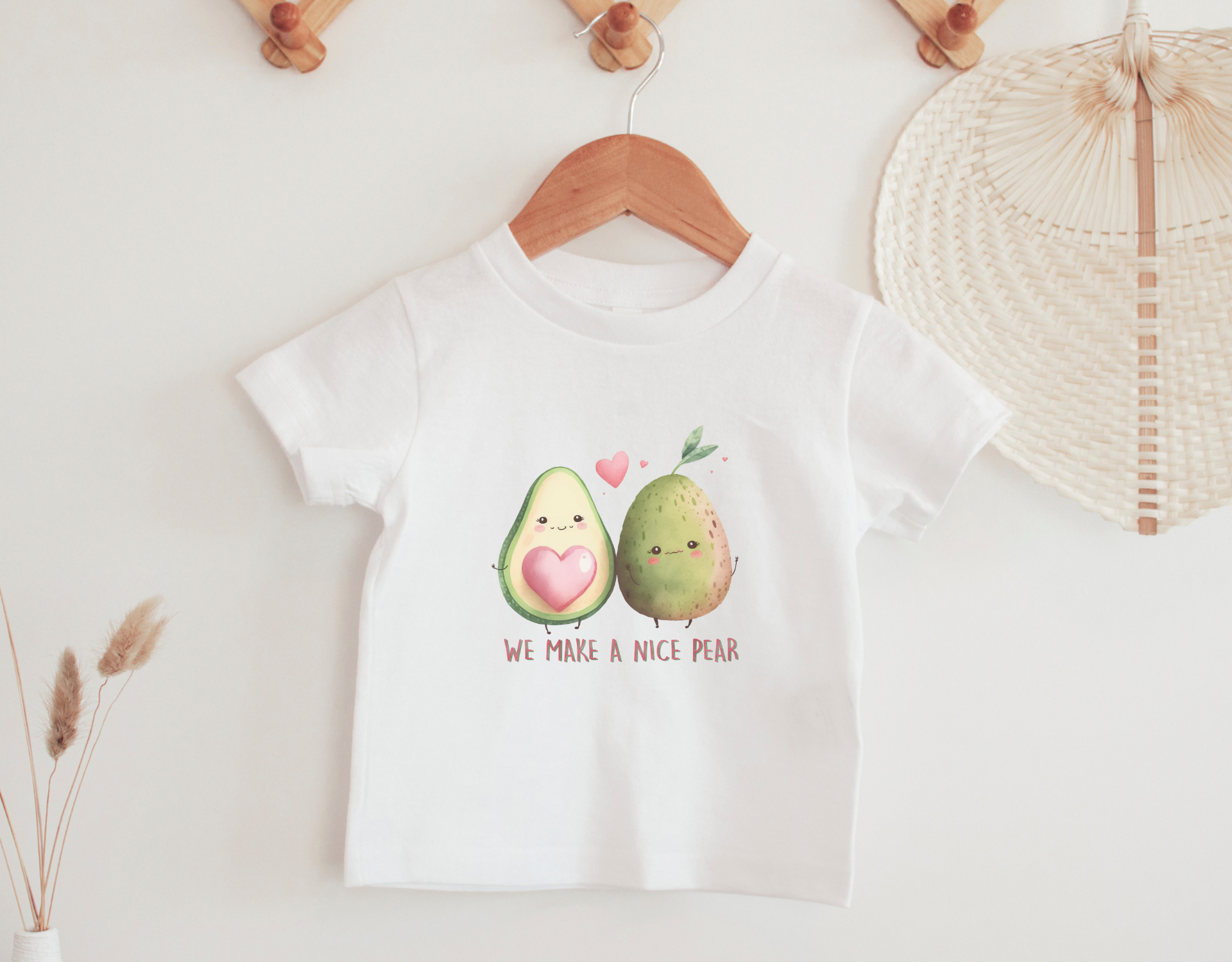 A cute toddler shirt featuring a pear design, perfect for Valentine's Day gifts, made with CPSIA compliant materials.