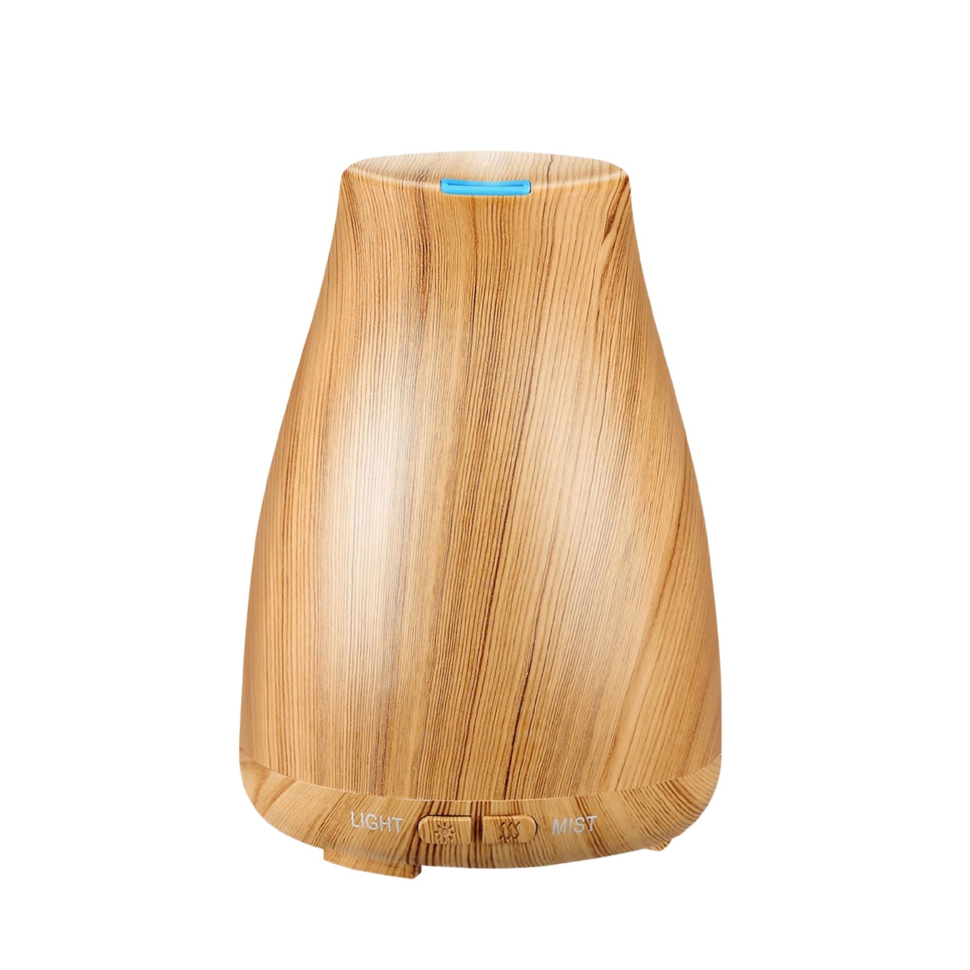 Aesthetics Ultrasonic Wood-Finish Aroma Diffuser with essential oils, showcasing its elegant design and color-changing features.