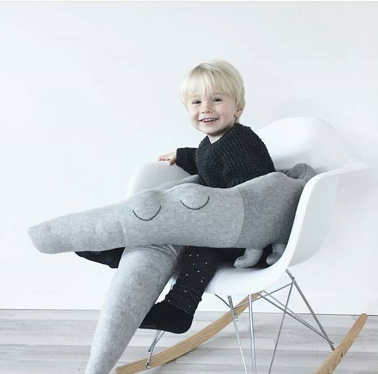 Cute long crocodile pillow for kids, designed as a stuffed toy and baby bumper, made from soft cotton fabric.