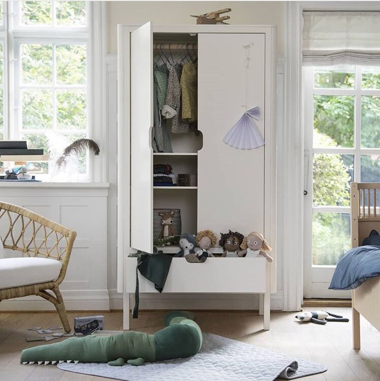 Cute long crocodile pillow for kids, designed as a stuffed toy and baby bumper, made from soft cotton fabric.