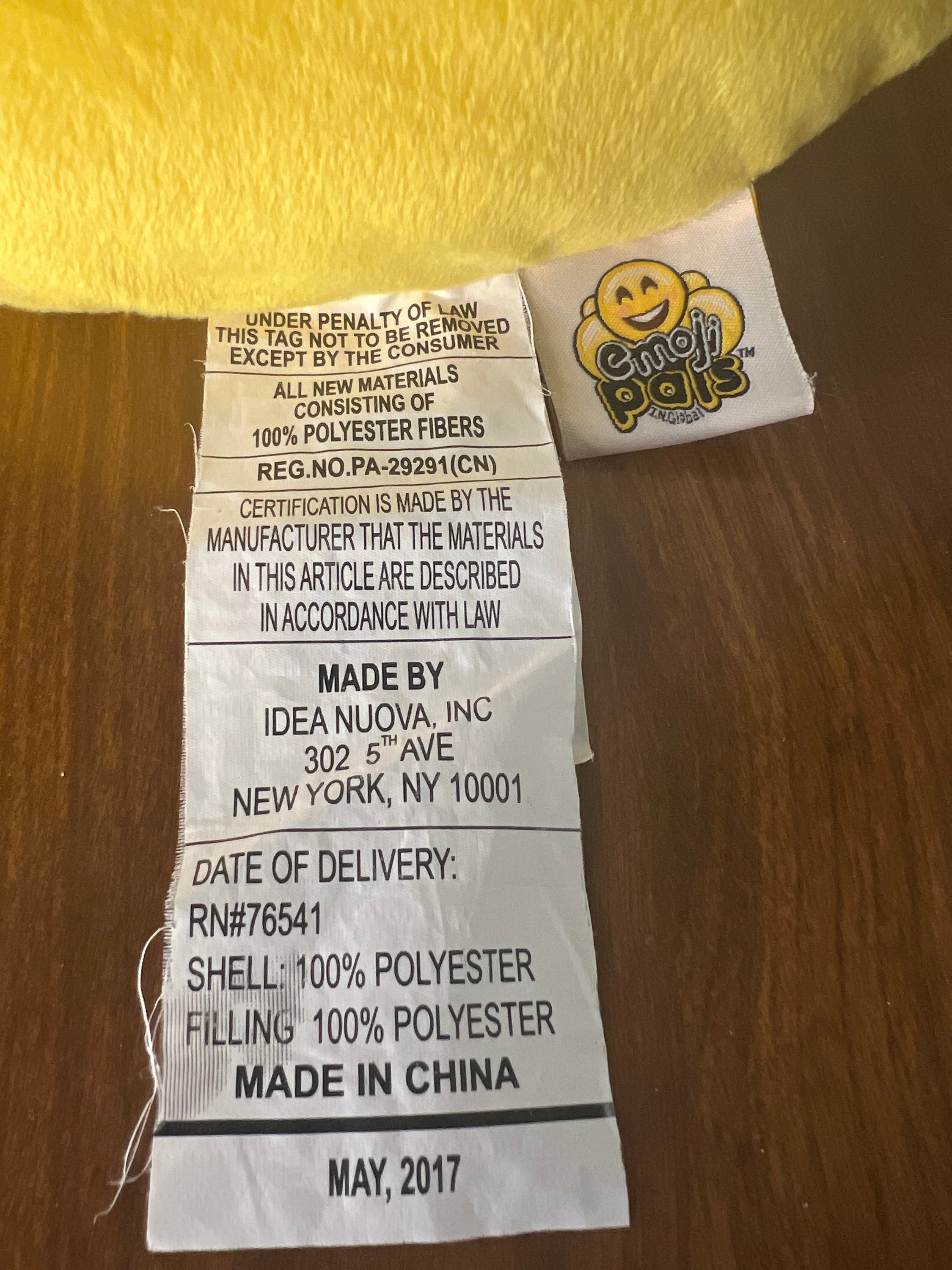 Vibrant yellow Emoji Sunglasses Pals Pillow featuring playful emoji design, perfect for home decor.