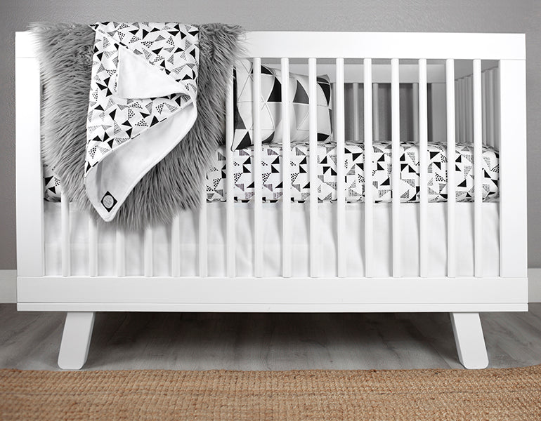Felix & Marti Baby Blanket featuring a modern Multi-Triangle design in soft cotton and plush minky fabric, perfect for nurseries.