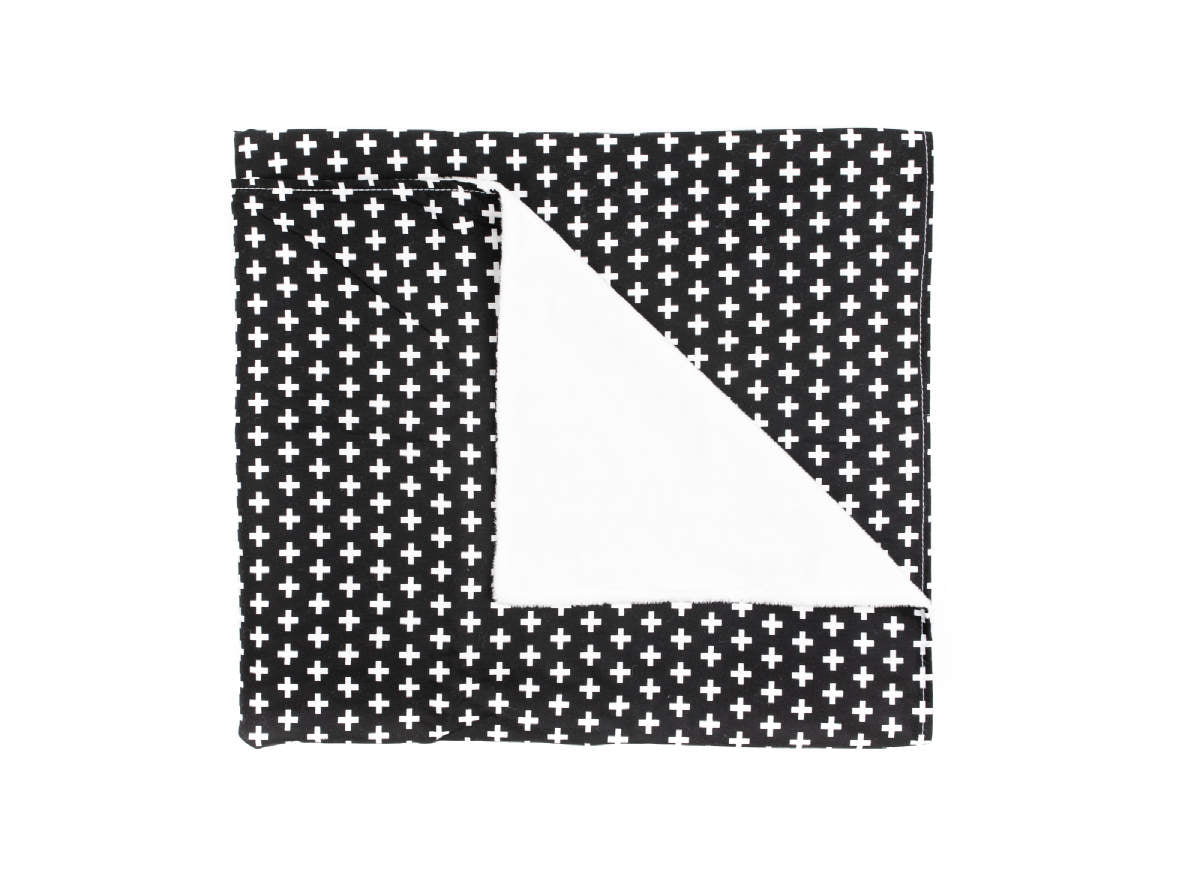 Lina Baby Blanket featuring a modern black and white swiss cross design with soft white minky backing, perfect for nurseries.