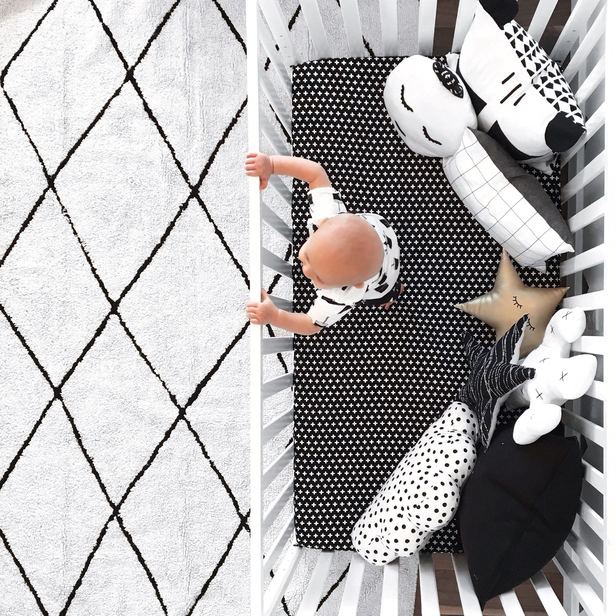Lina Deluxe Crib Bedding Set featuring Swiss cross design in black and white with a grey weave blanket, perfect for modern nurseries.