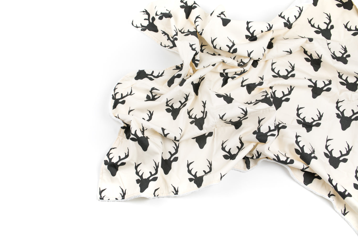 Mila Deluxe Crib Bedding Set featuring woodland deer design with grey weave blanket and charcoal crib skirt.