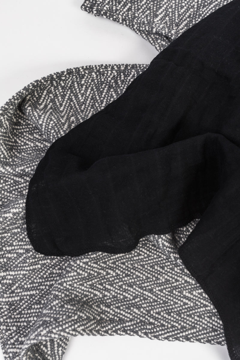 Premium Cotton Large Swaddle in Midnight Black, showcasing its soft texture and elegant design, perfect for modern nurseries.