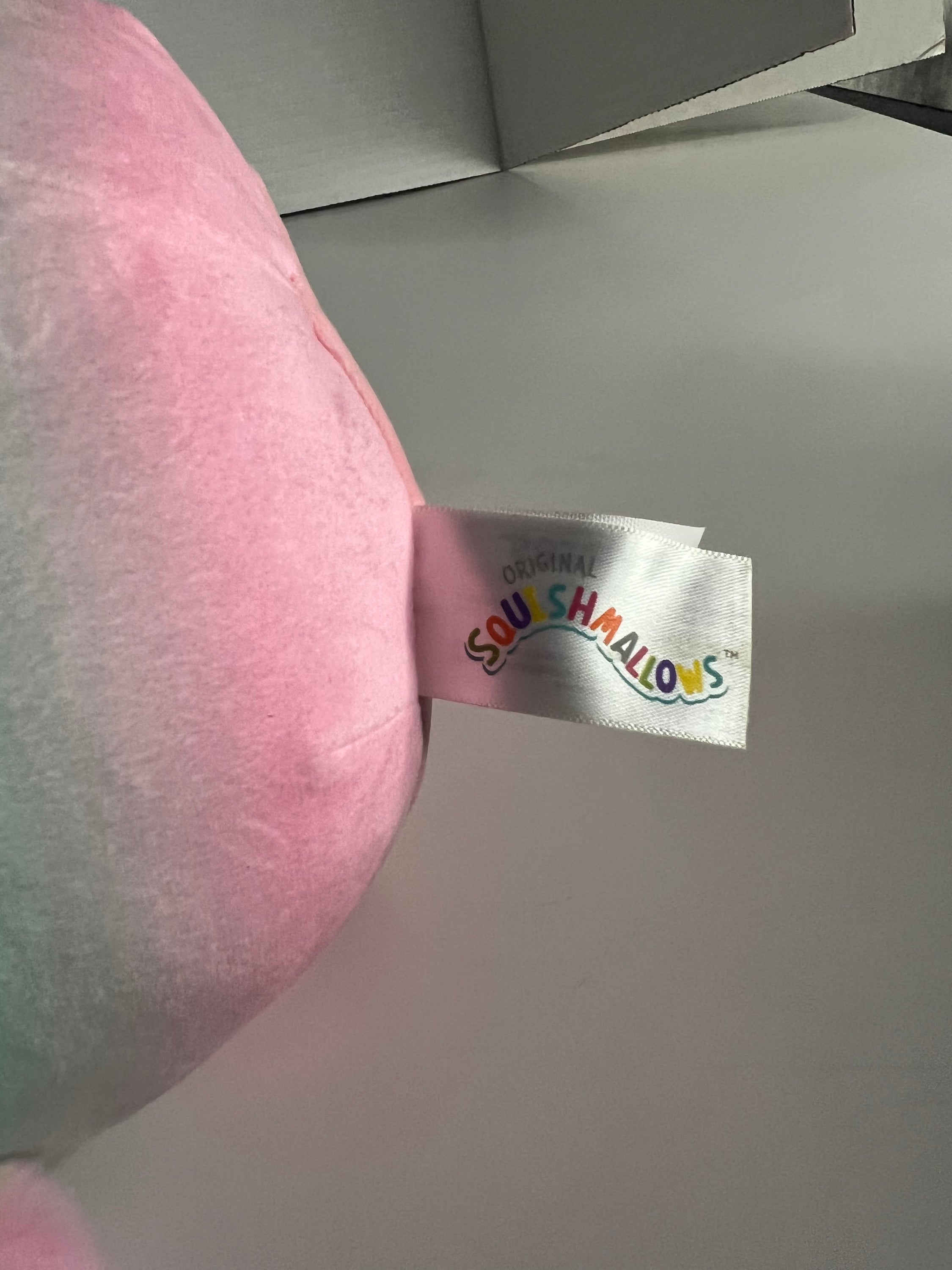 8-inch Louisa the Penguin Squishmallow with multicolor design, perfect for Valentine's Day gifting.