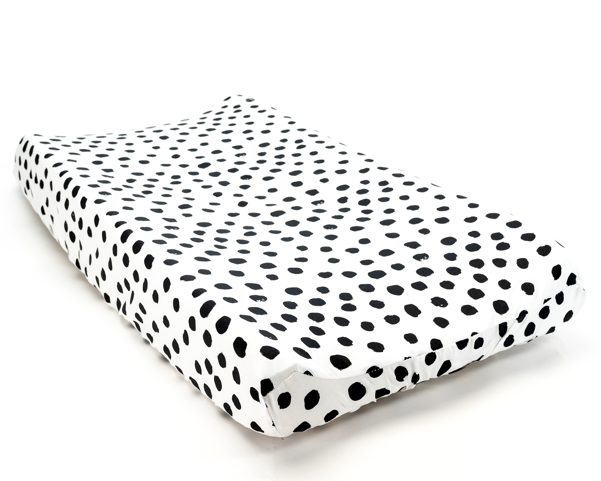 Zoe's Spots & Dots Changing Pad Cover featuring playful black polka dots on a white background, made from premium cotton.