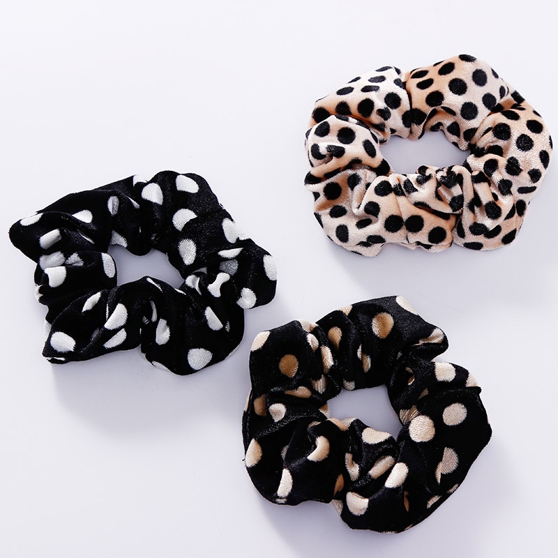 A stylish women's headwear made of soft coral fleece featuring a trendy leopard spot pattern, designed for comfort and a snug fit.