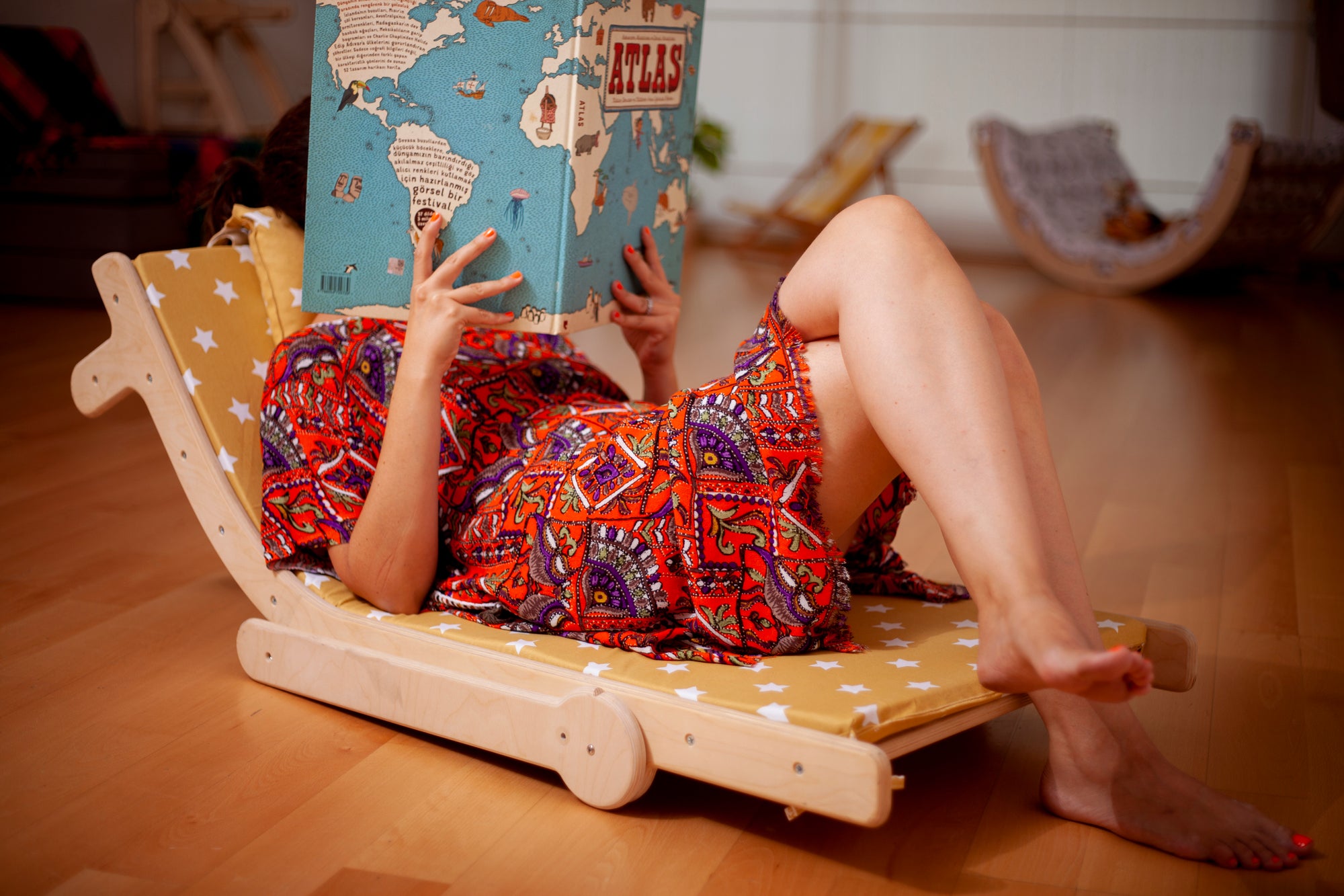 Adjustable lounge chair for kids with a comfy removable pad, designed for comfort and style.