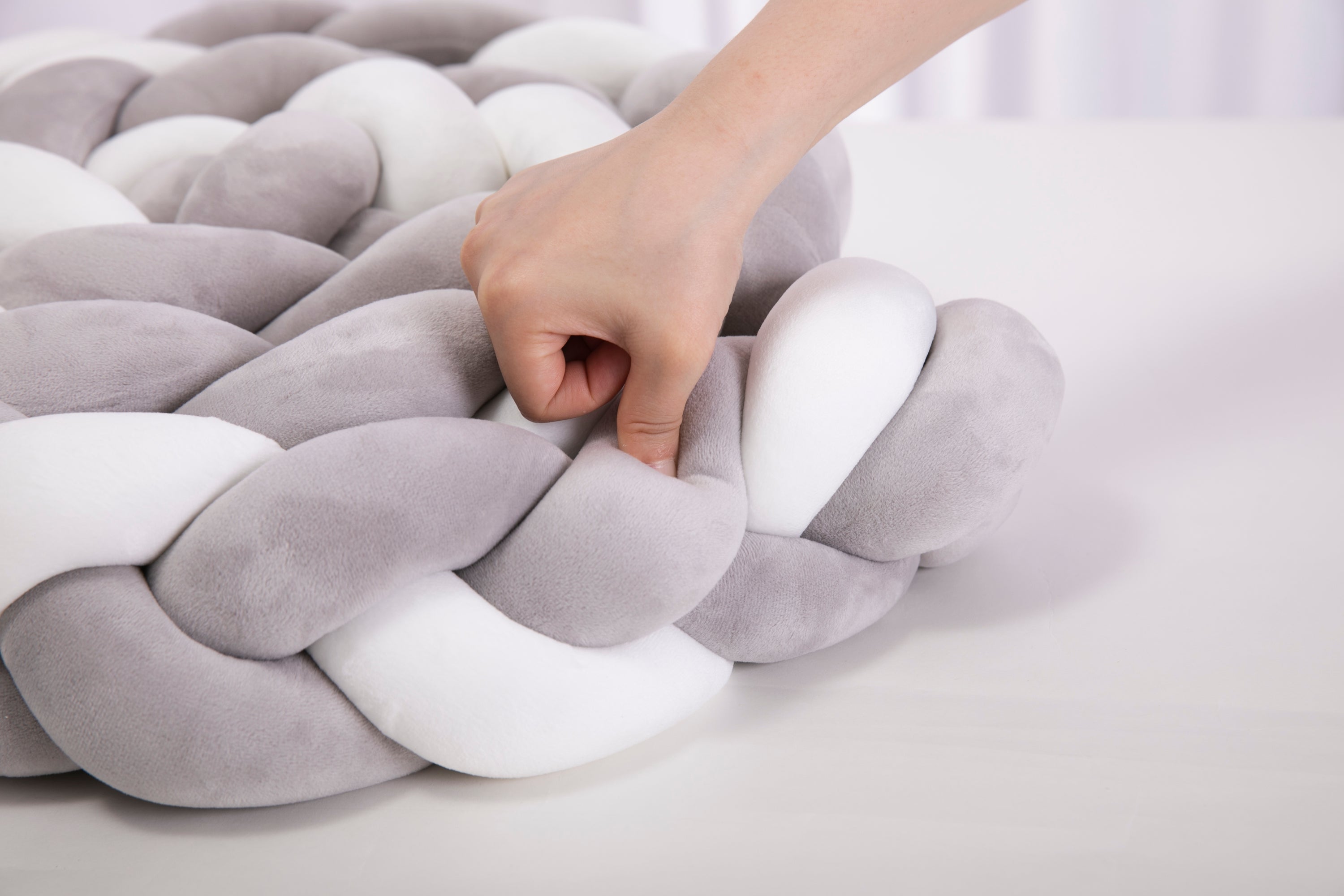 ARYA Braided Bumper in a stylish braided design, made from premium cotton, providing a safe and comfortable environment for babies.