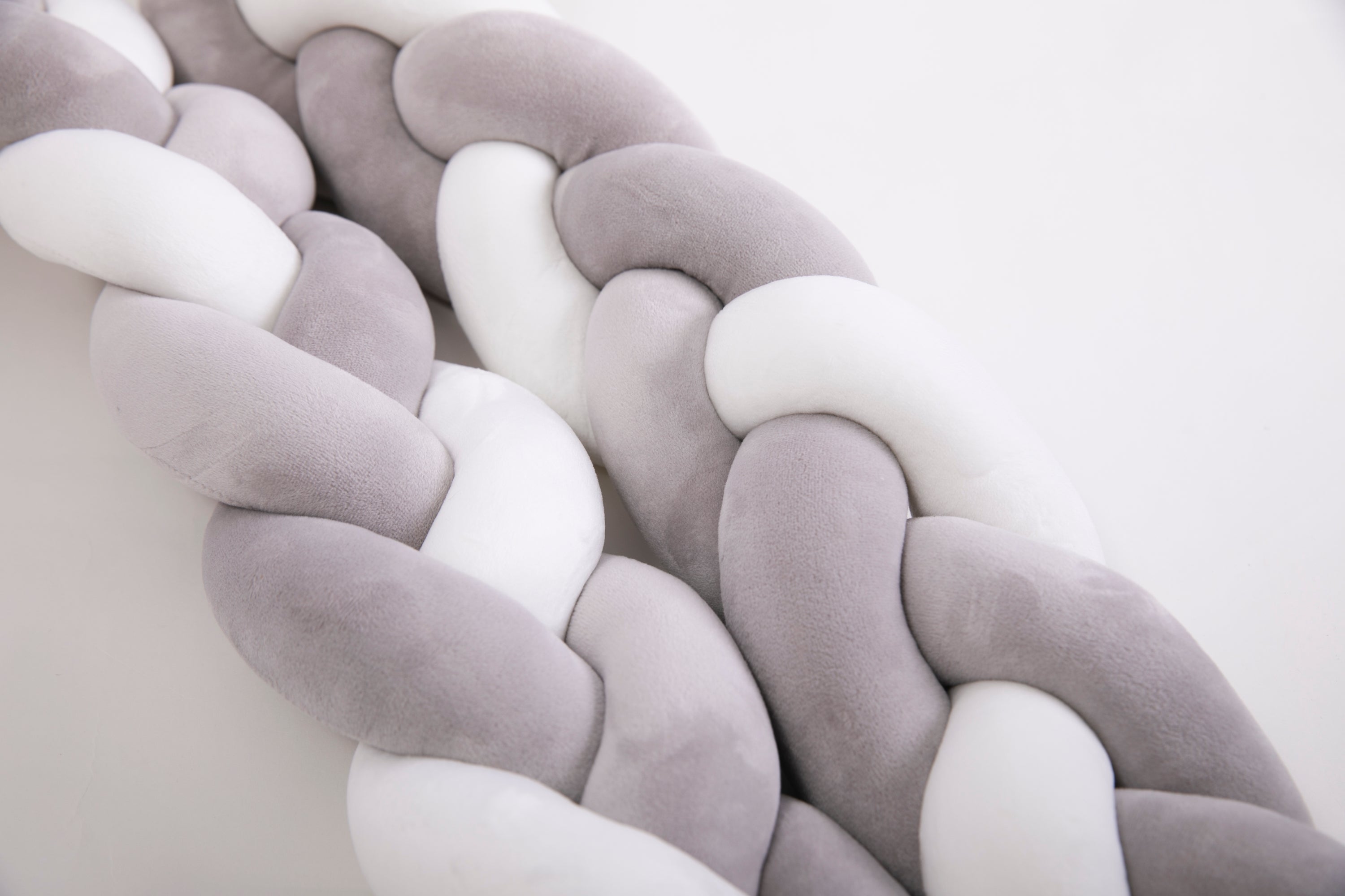 ARYA Braided Bumper in a stylish braided design, made from premium cotton, providing a safe and comfortable environment for babies.