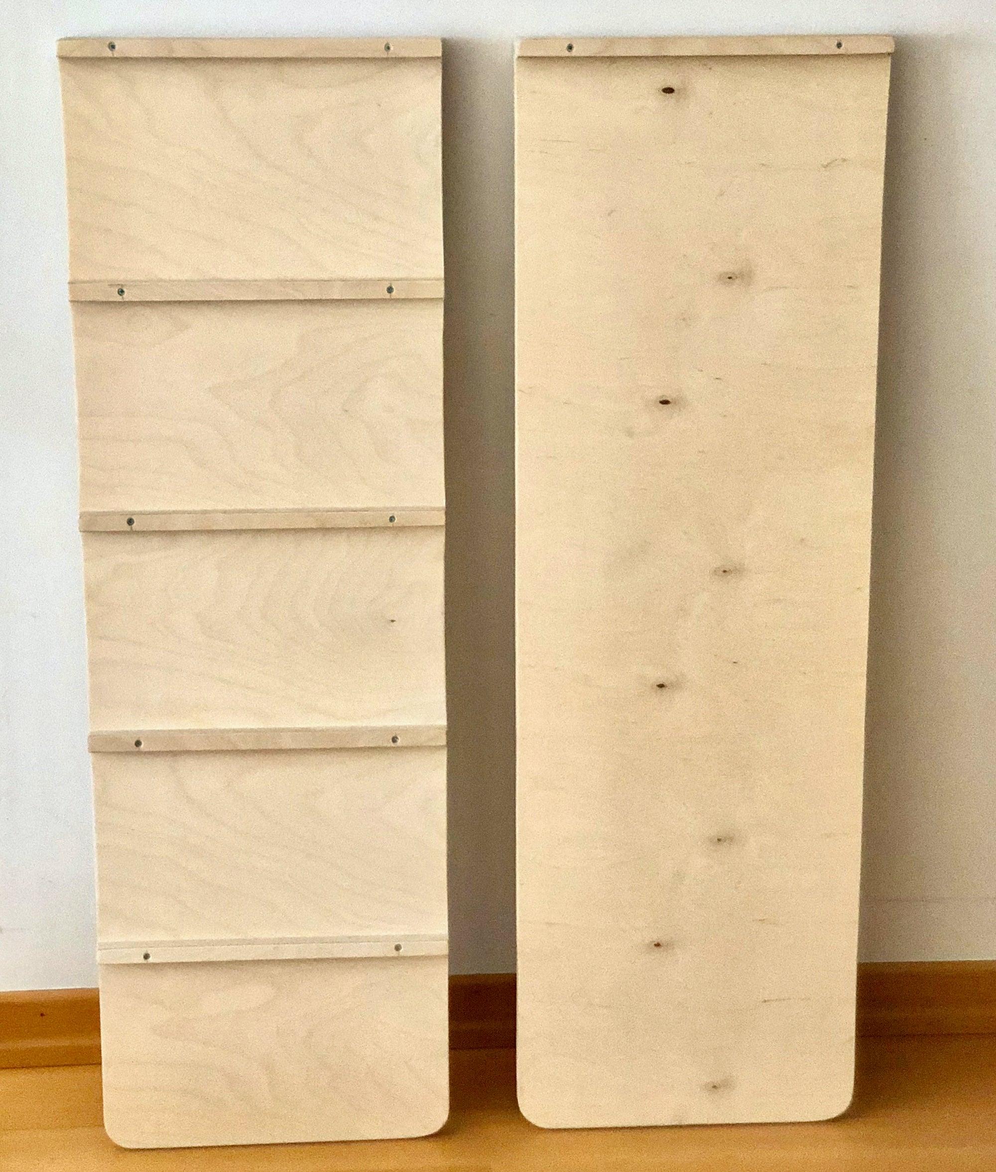 Wooden climbing arch set with ladder ramp and blue star pillow, designed for children's outdoor play.