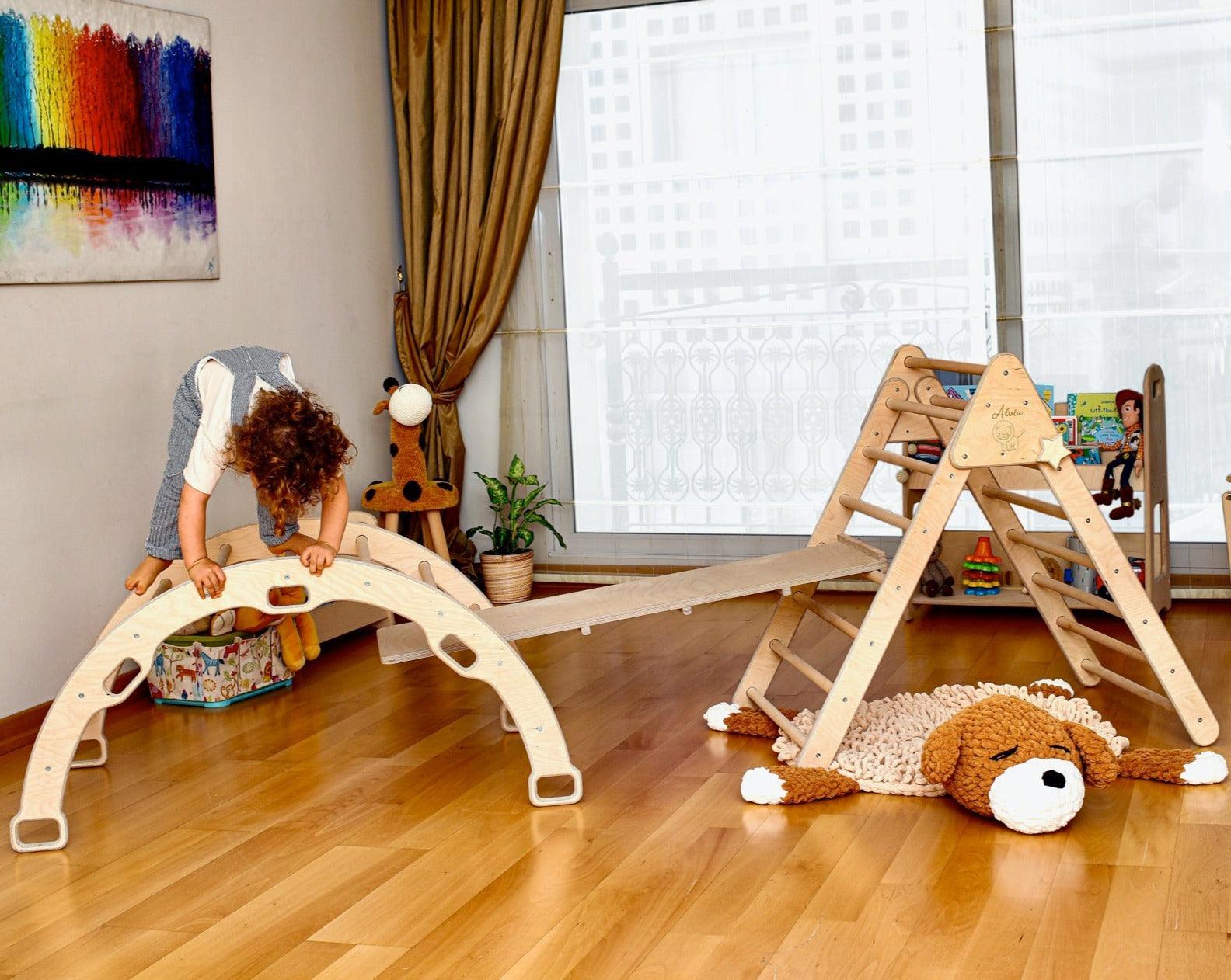 Montessori Climbing Set featuring a Pikler Triangle, Climbing Arch, and a 2-in-1 Ramp, made from natural wood, designed for children's play and development.