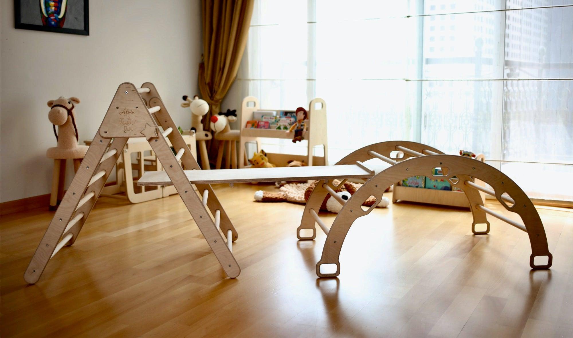 Montessori Climbing Set featuring a Pikler Triangle, Climbing Arch, and a 2-in-1 Ramp, made from natural wood, designed for children's play and development.