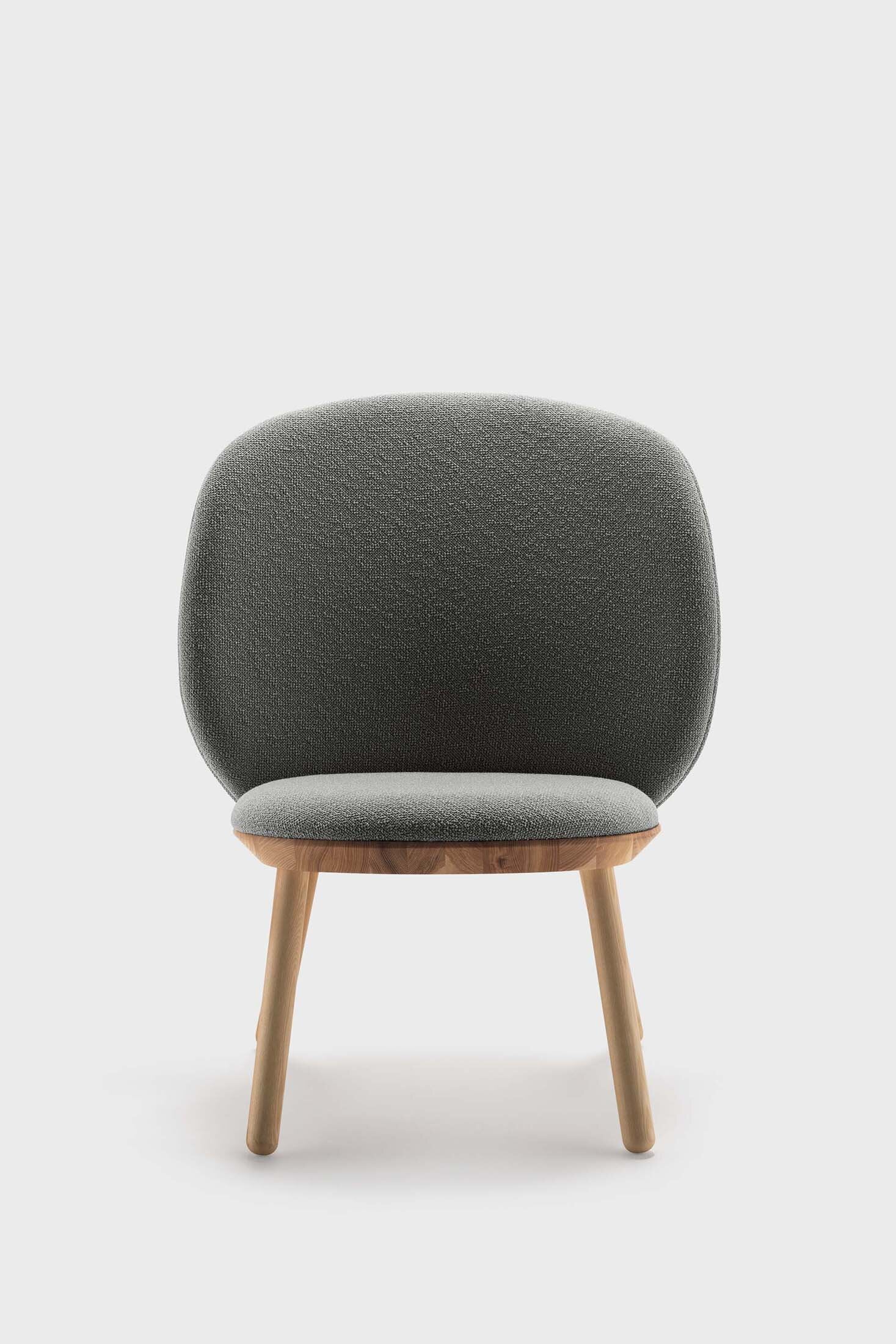 Naïve Low Chair in Black Solid Ash featuring a leather strap backrest, showcasing its elegant design and sturdy construction.