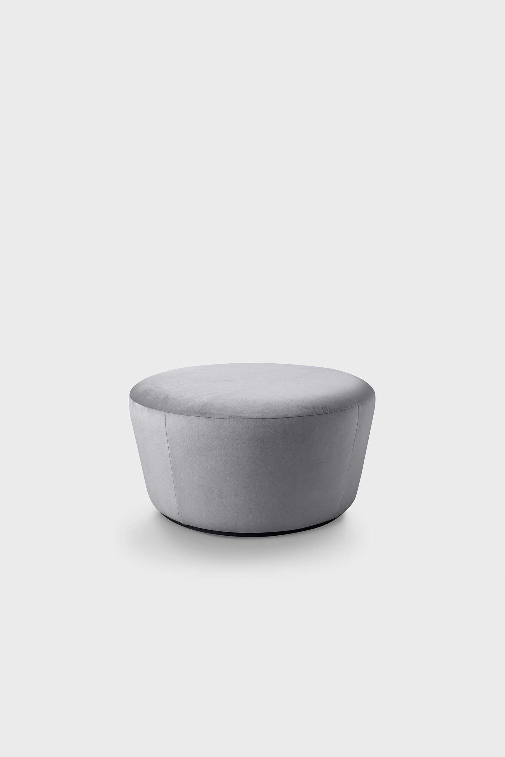 Naïve Pouf featuring a cupcake silhouette in soft velour, perfect for stylish seating in any room.