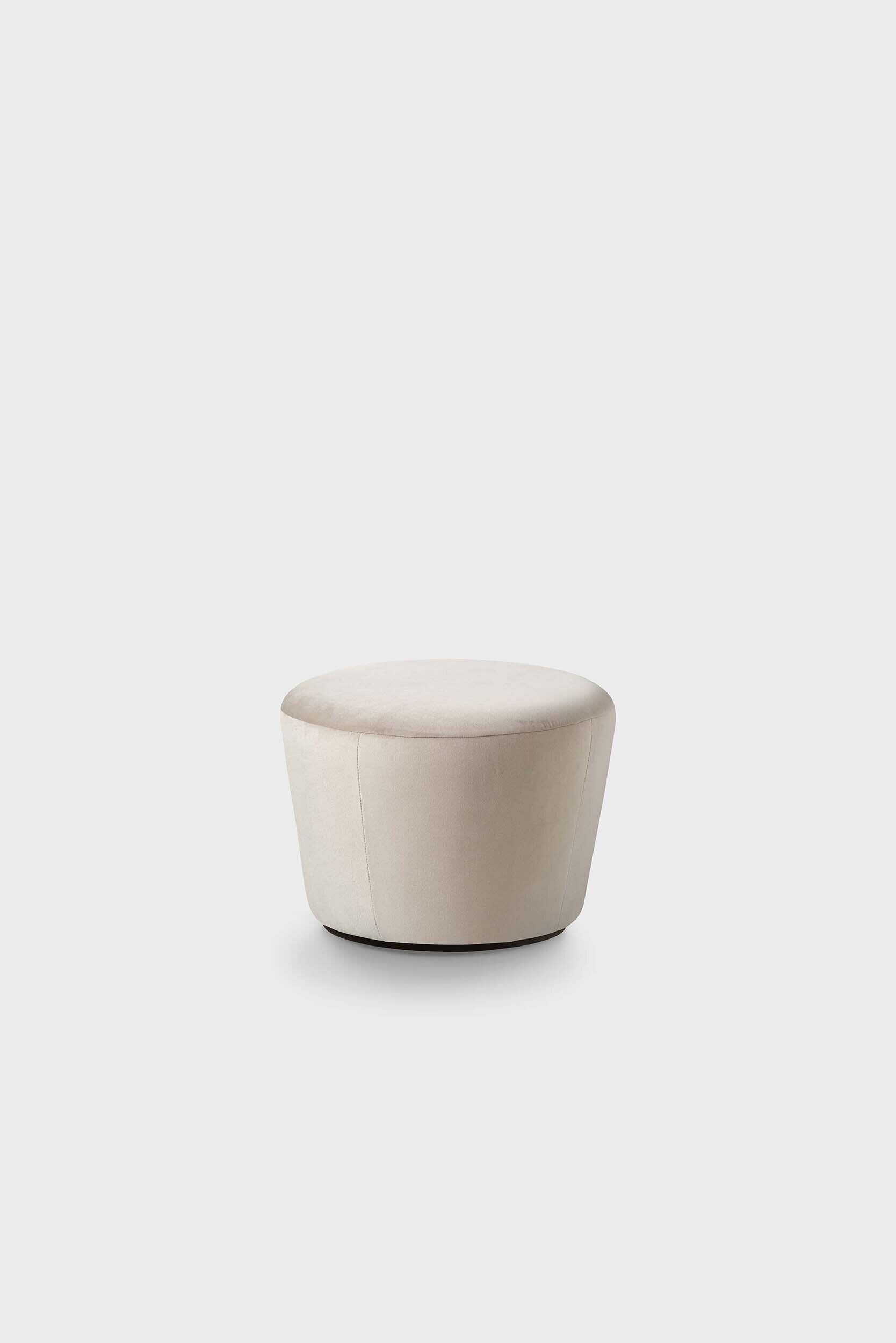 Naïve Pouf featuring a cupcake silhouette in soft velour, perfect for stylish seating in any room.