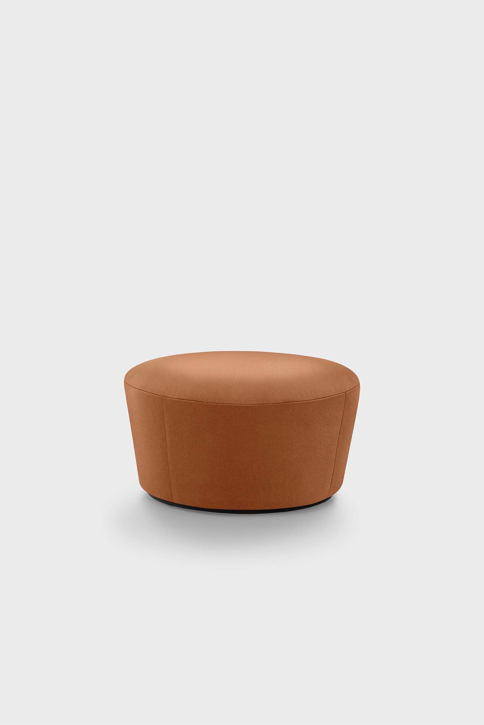 Naïve Pouf featuring a cupcake silhouette in soft velour, perfect for stylish seating in any room.